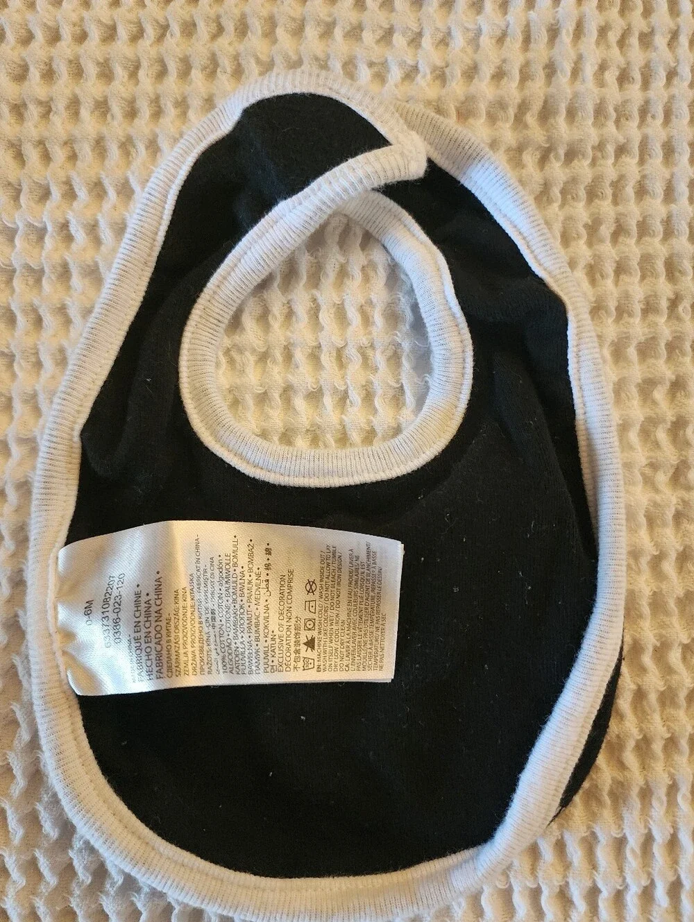 Nike Black Baby Bib with White Trim and 'Just Do It.' Print